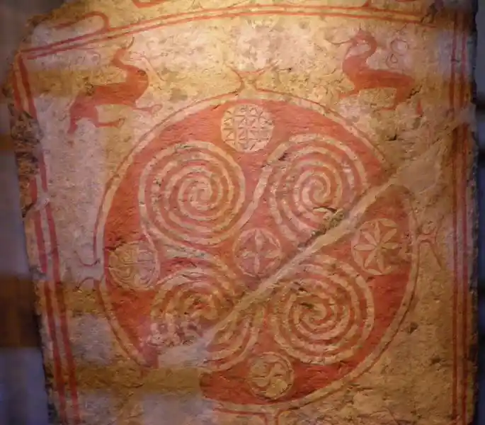 Rounded swastikas with spiral edges inside a circle